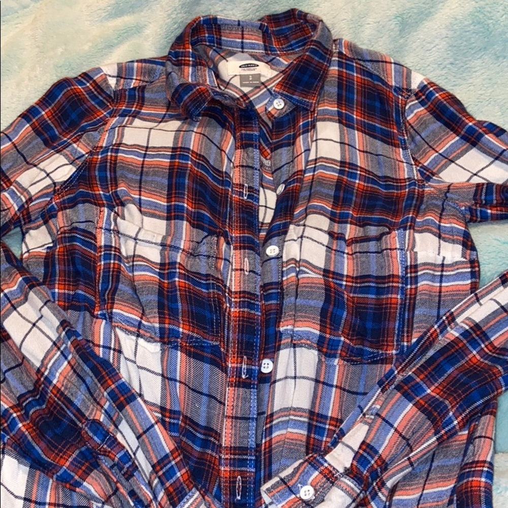 Plaid button up shirt.